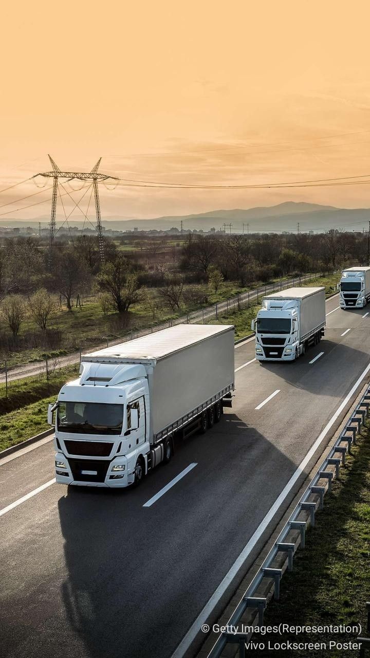 RK Golden Express truck convoy at golden hour